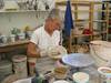 2011 Tour artist Sarah Jaeger glazing a bowl